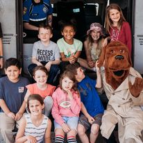 Crime Stoppers of Copperas Cove community event with children and McGruff